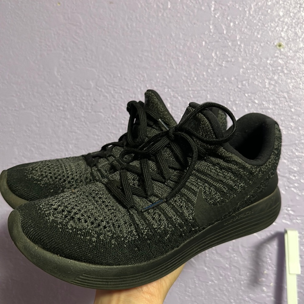 Women’s black Nike Athletic Shoes.